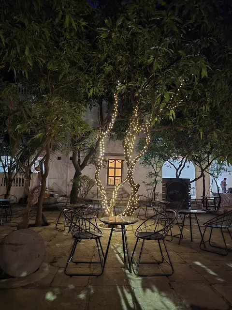 String-lit courtyard at Cafe Deja Vu