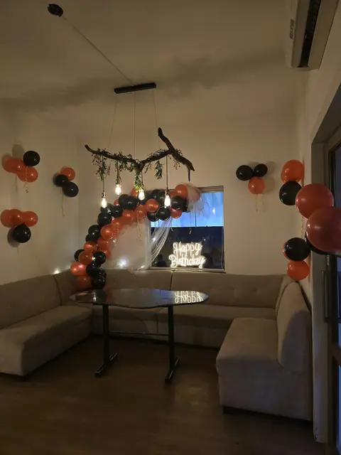Indoor lounge with balloon decoration, Bavdhan